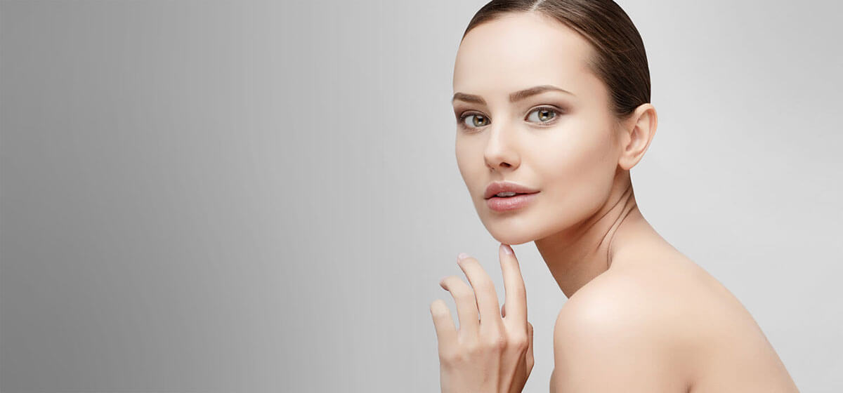 A happy patient with stunning, radiant skin after Botox and microneedling by a licensed doctor at Bright Dental Clinic Des Plaines.