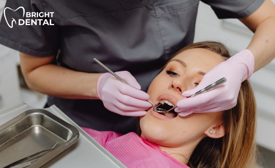Close-up of dental floss being used between teeth, highlighting a daily oral hygiene mistake many people make