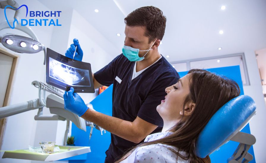 Dentist examining patient's teeth during checkup, preventing common daily oral hygiene mistakes