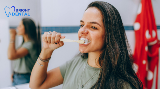 Person brushing teeth with fluoride toothpaste for Tooth decay Prevention. 5 Essential Habits for Preventing Tooth Decay
