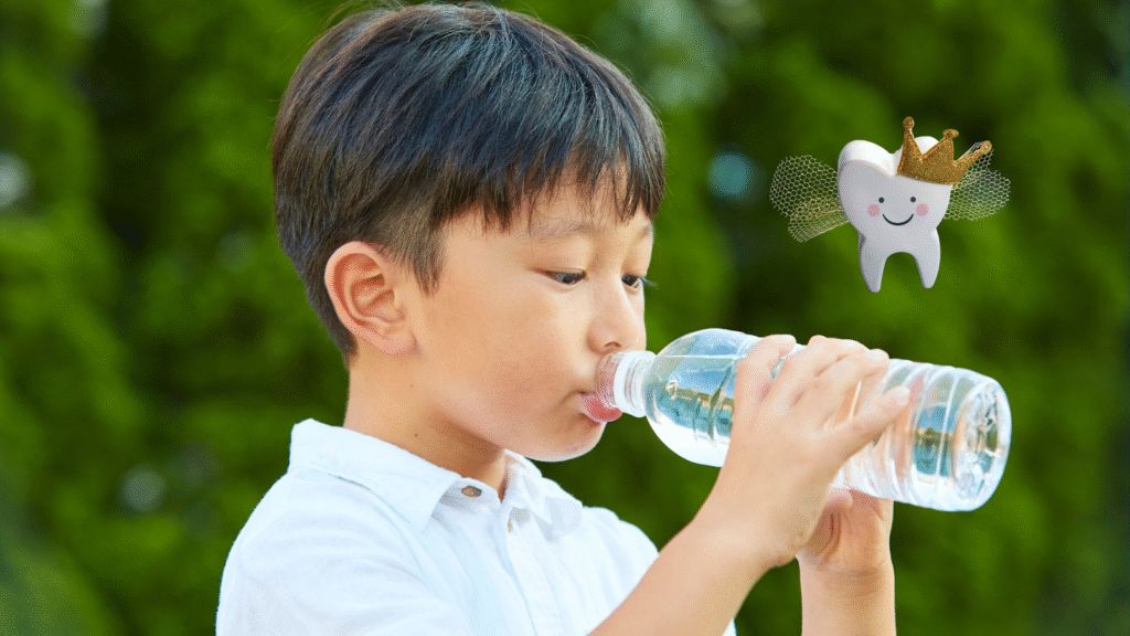 Glass of water symbolizing hydration as a key factor in Tooth decay Prevention