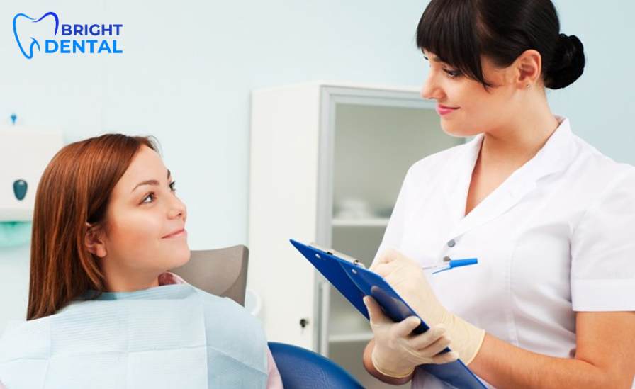 Dentist performing routine dental checkup in Des Plaines dental clinic