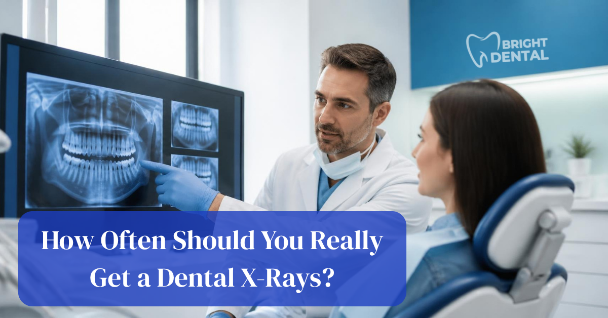 Dentist reviewing digital dental x-rays to determine patient x-ray frequency at Bright Dental